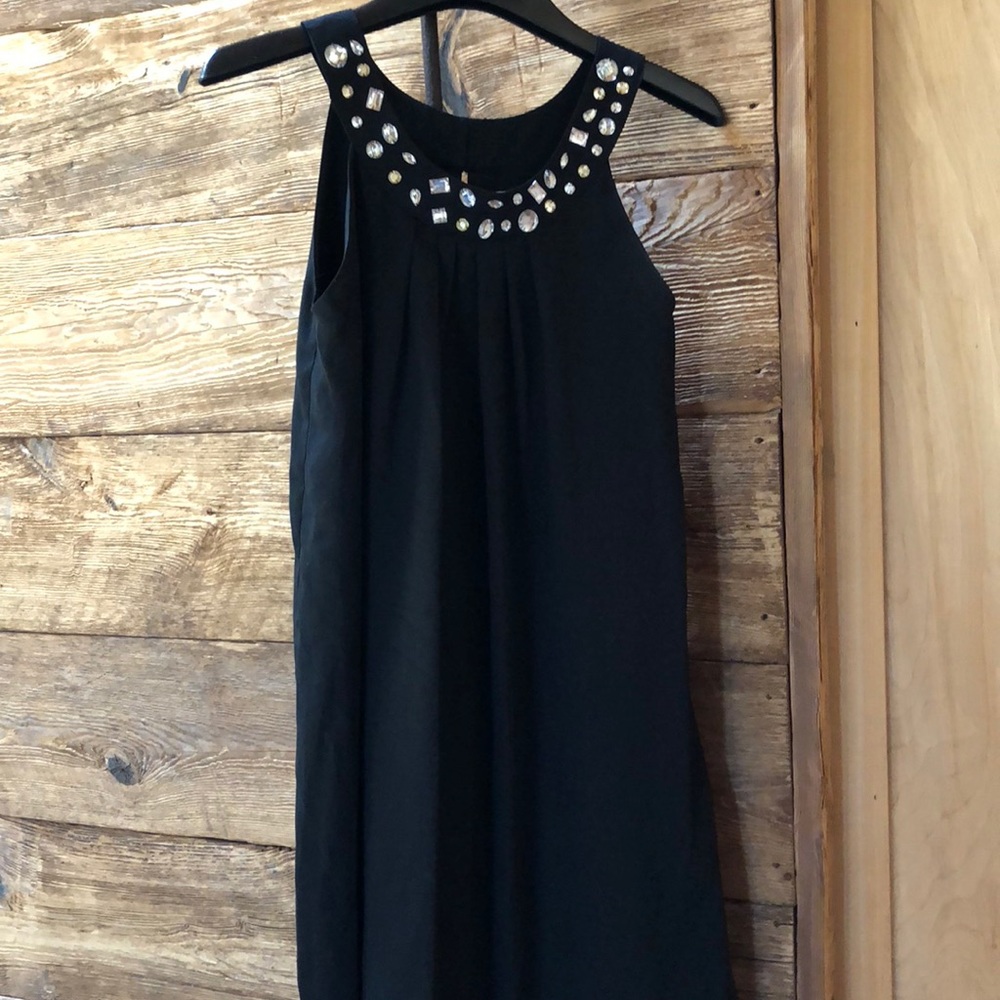 Blush black dress with faux hem neckline